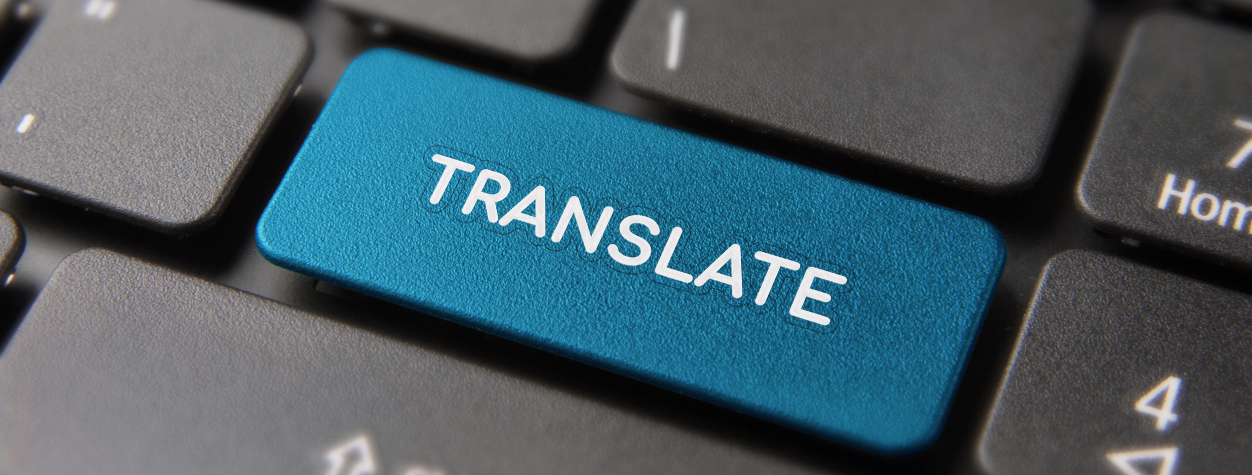 Language translation concept on computer keyboard