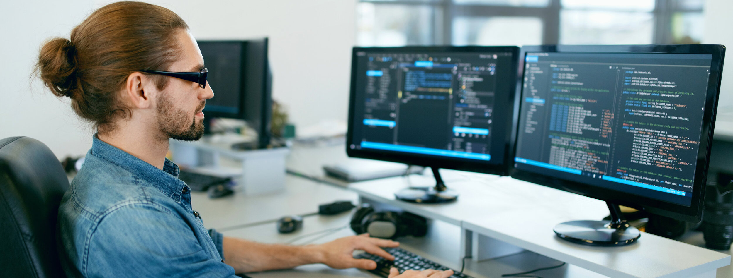 Programming. Man Working On Computer In IT Office, Sitting At Desk Writing Codes. Programmer Typing Data Code, Working On Project In Software Development Company. High Quality Image.