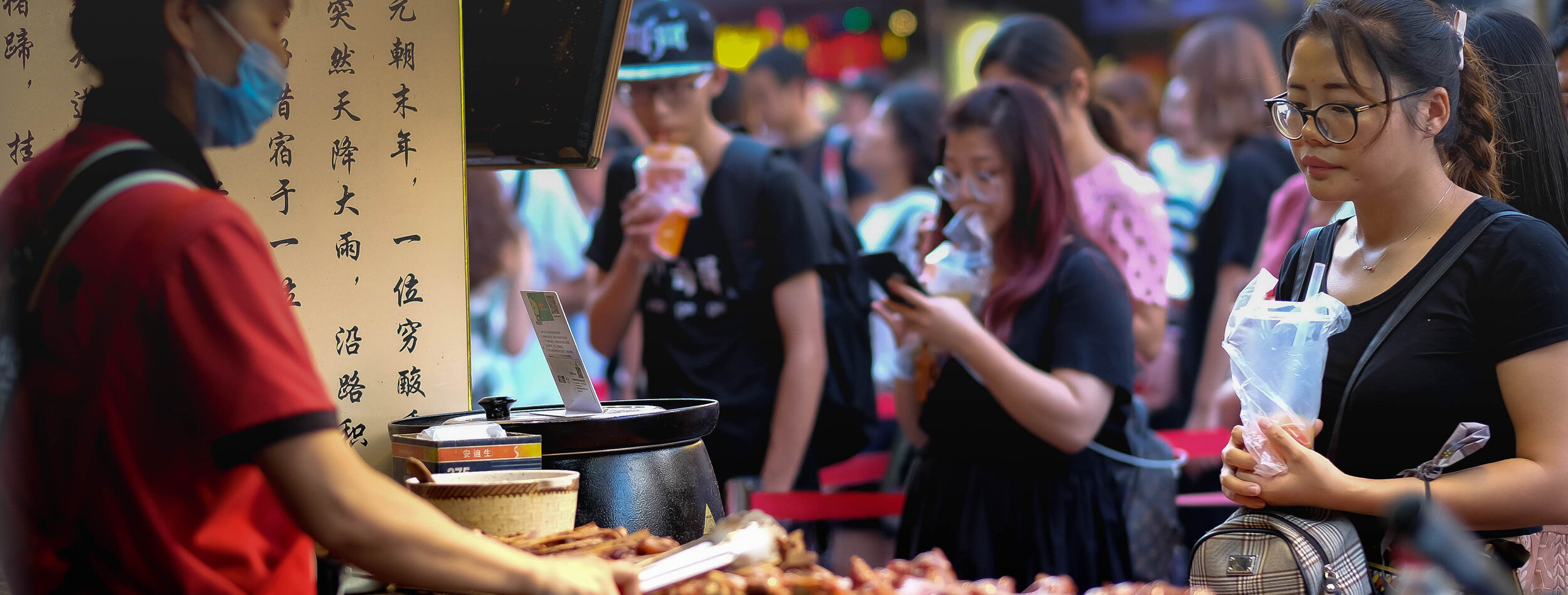 WUHAN CHINA-September 8 , 2018: One woman who sell meet grill. It’s famous food in here.