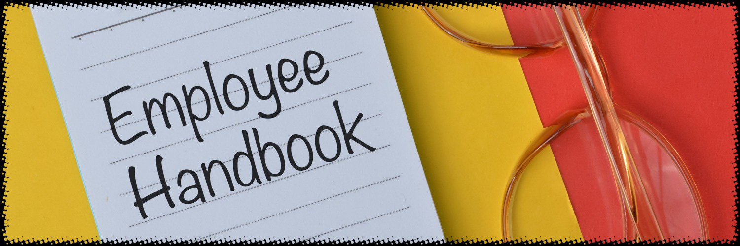 Notebook with Employee Handbook written on it
