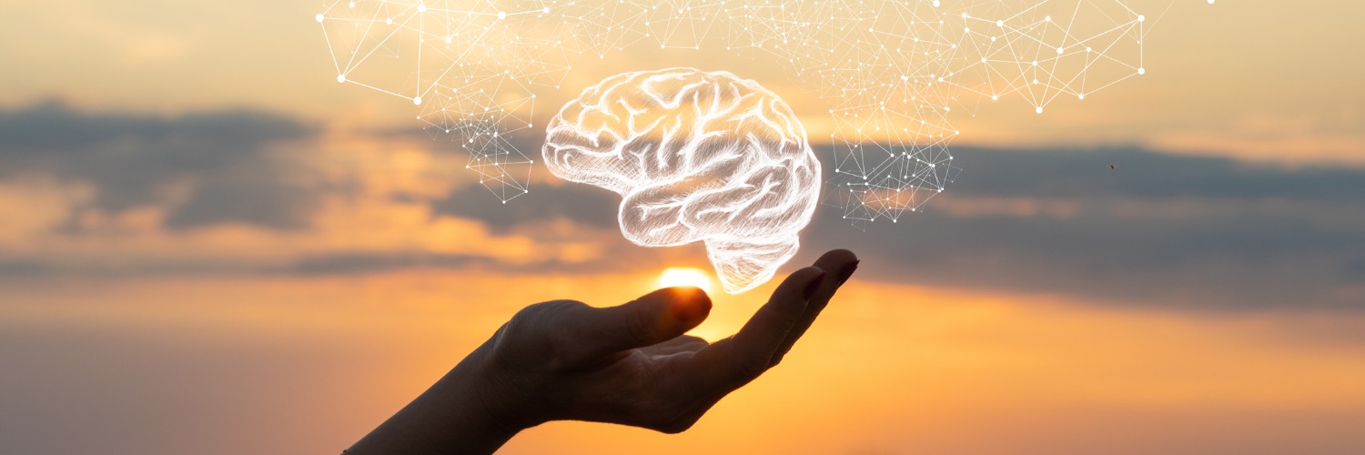 hand holding human brain